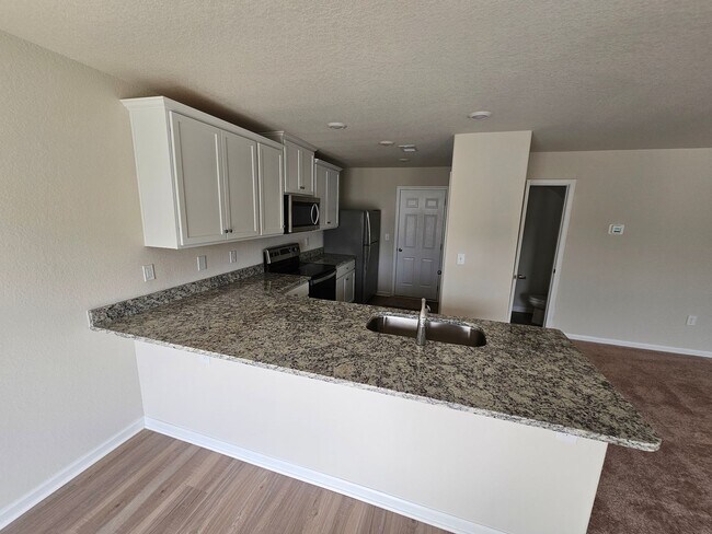 Building Photo - Brand New 3BR Home Minutes from the Airport