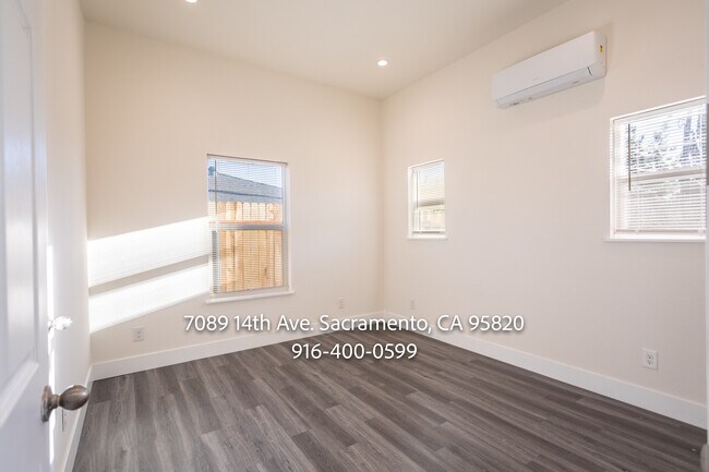 Building Photo - 7089 14th Ave