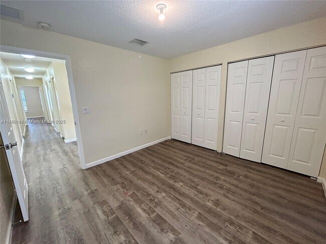 Building Photo - 7828 Parsons Pine Dr