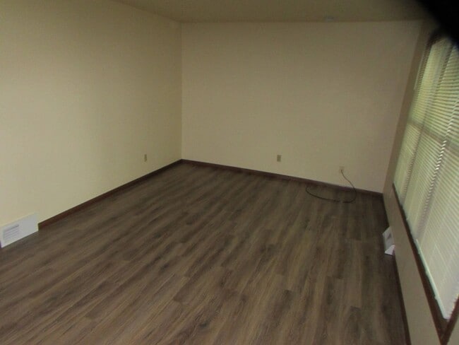 Building Photo - Spacious 3BD/1.5BA with Attached Garage and Backyard! - Available 4/1/2026