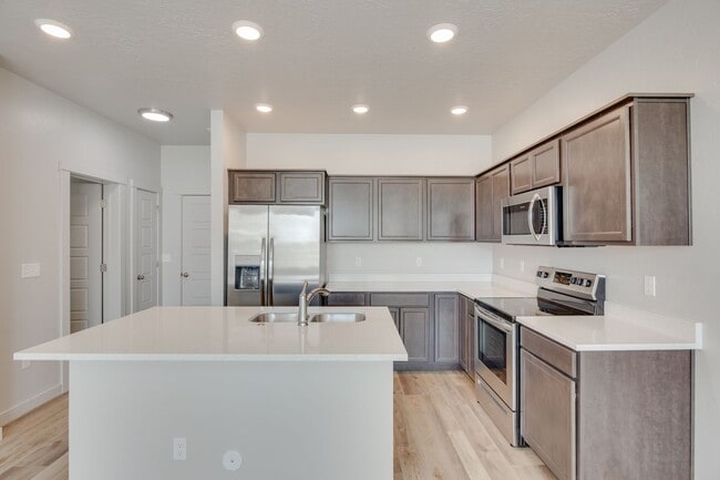 Building Photo - Beautiful 3 bedroom townhome now available!