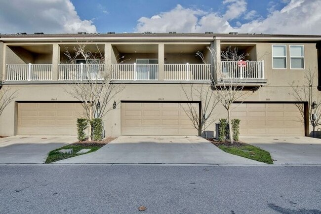 Building Photo - Luxurious 3/2.5 Modern Townhome with a Private Balcony and a 2 Car Garage in the Exclusive Gated ...