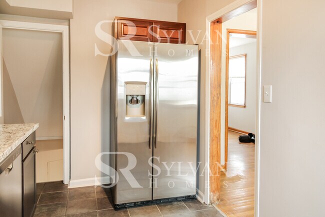 Building Photo - Turn the key. Enter. Smile. Repeat every day!