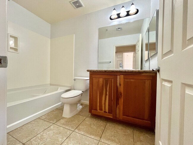 Building Photo - Spacious 2 Bedroom High-Rise Condo with Resort-Style Amenities & Oversized Balcony