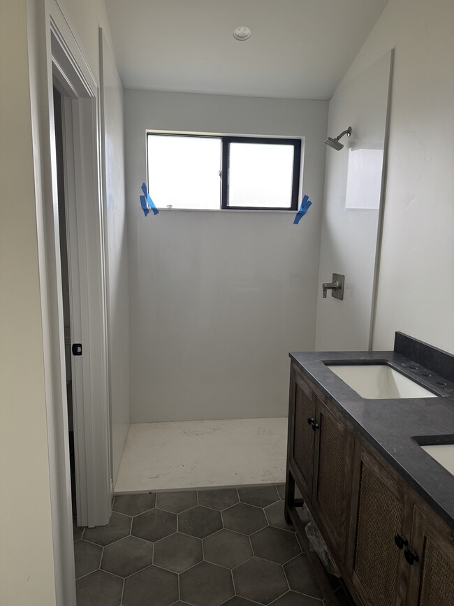 double vanity and walk in shower in the master bath - 269 Adobe Creek Ln