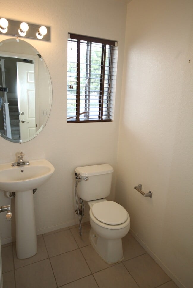 Building Photo - Gated 3BR|2.5BA|1508SF|2 Car Garage| Tenant pays $175 for WS&G | Community Pool, Clubhouse, & Fis...