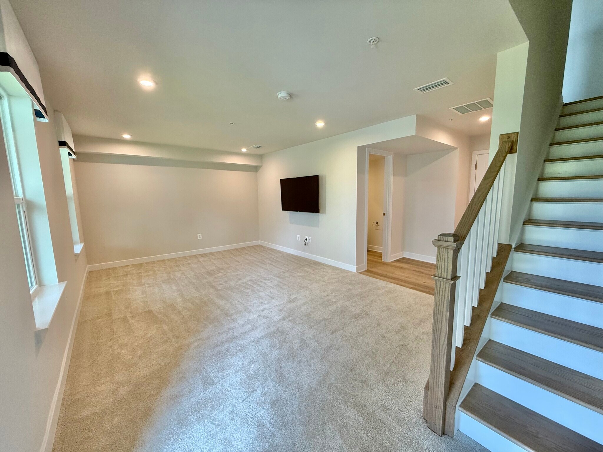 Wall mounted TV in first floor den or second family room - 7841 Blackbriar Way