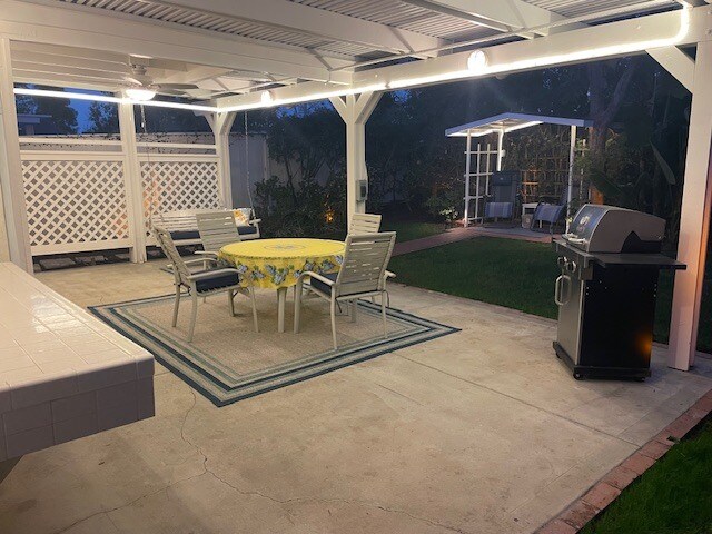 Patio at night - 10545 Kemerton Rd