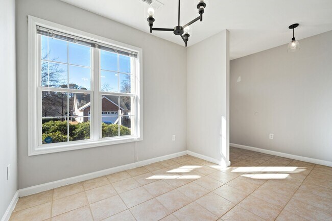 Building Photo - **Applications Pending** Ground-Level 2BR Condo with Community Pool!