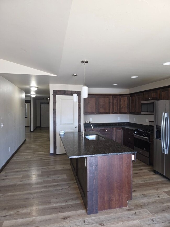 Building Photo - $500 OFF First Month's Rent! Spacious 3BR/2BA Home in Quiet Belgrade Neighborhood with Fenced Bac...