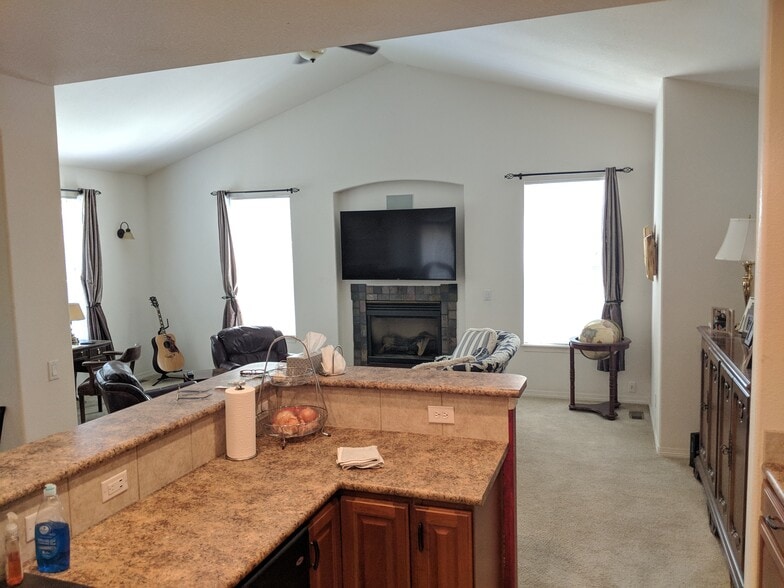 Living area from kitchen - 4545 S. Monaco St. Unit 127