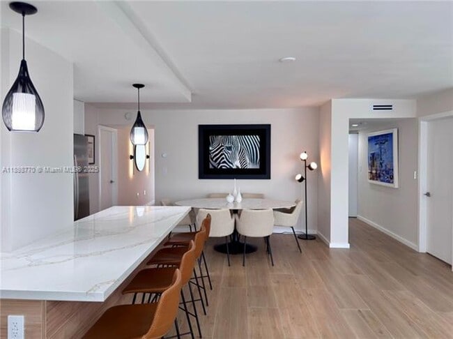 Building Photo - 10230 Collins Ave