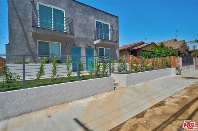 Building Photo - 965 S Lorena St