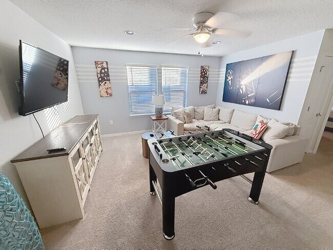 Building Photo - Welcome home to the fully furnished 5-bedroom, 5.5-bathroom private pool home located in Windsor ...