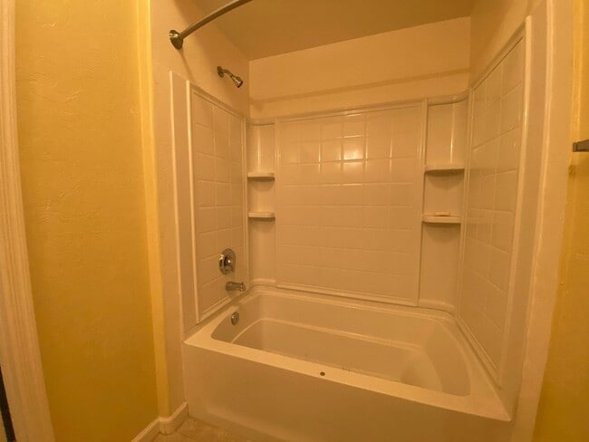 Building Photo - First Floor Unit with 2 Car Garage with Di...