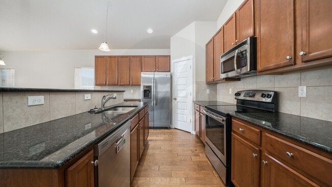 Building Photo - Immaculate Rancher in Spring Creek Neighbo...