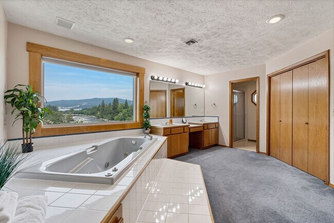 Building Photo - Stunning Home and Three Bay Shop Along Spo...