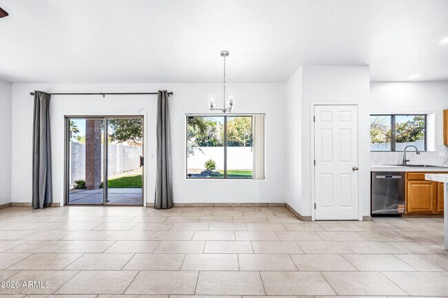 Building Photo - 9054 W Custer Ln