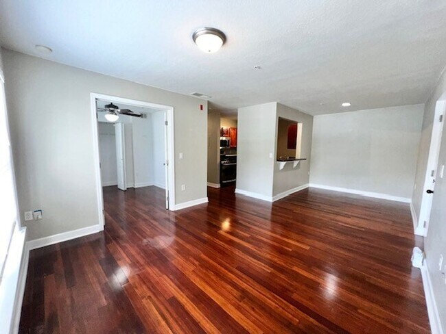 Building Photo - MOVE IN NOW!! Gated community Miriada! 1st floor 1X1.5 bath condo near pool area!!! Laminate wood...