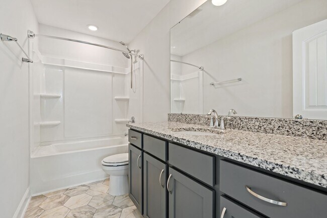 Building Photo - Available now! Spacious & beautiful 3 bedroom townhome!
