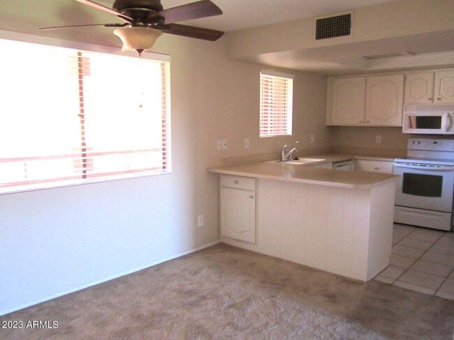 Building Photo - 12212 N Paradise Village Pkwy W