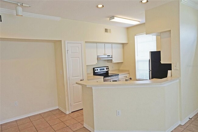 Building Photo - 9850 Lake Chase Island Way
