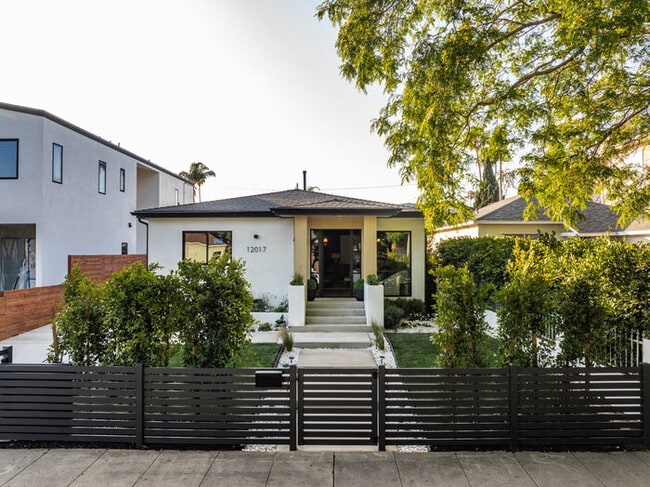 Building Photo - Brand-New Designer Home — 2 Bed + 2 Bath + Office | Gated Yard & Private Driveway Parking