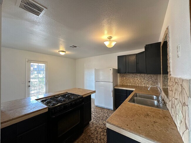 Building Photo - CASA MESA CONDO