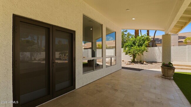 Building Photo - 8638 E Dahlia Dr