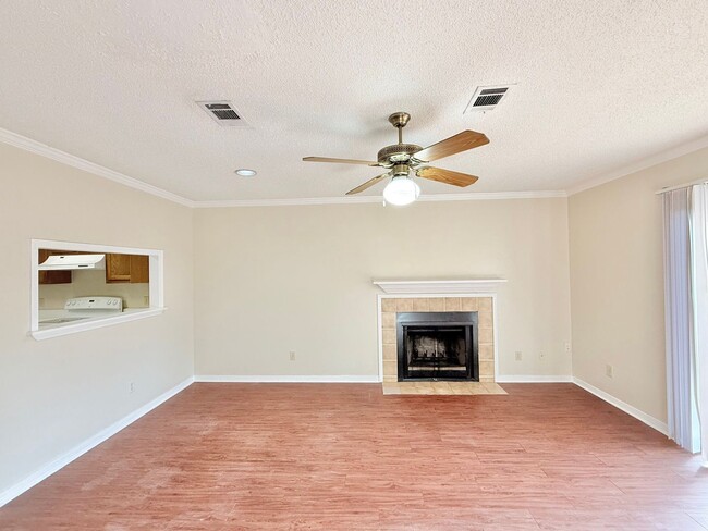 Building Photo - Spacious 2-Bedroom Townhome - Fenced Backyard