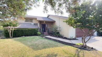 Building Photo - Welcome home to breathtaking views in this...