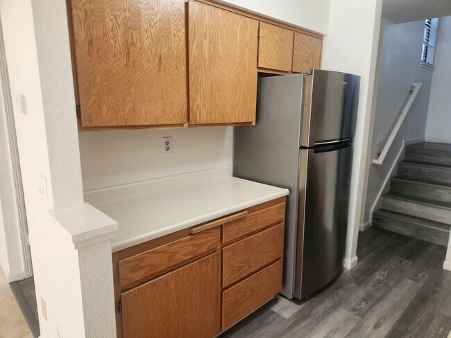 Building Photo - A Must See! Nice and bright, lots of light, two story condo in a well maintained complex.