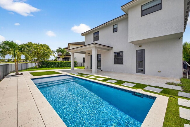 Building Photo - Northwest 88th Avenue, Miami Lakes, FL 33018 - 4 BR 3.5 BA single-family home