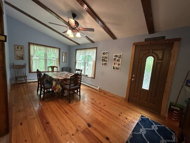 Building Photo - Charming 3BR Waterfront Retreat with Sunroom, Brick Accent & Scenic Lake Views