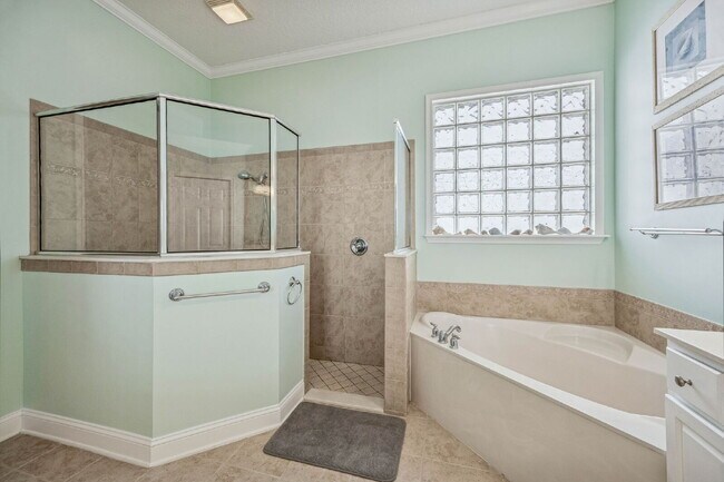 Building Photo - Coastal Living Just 2 Blocks from the Beach | Gated Community + Resort Amenities