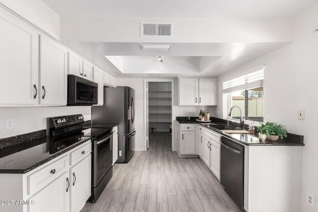 Building Photo - Beautiful three-bedroom, two-bath with pool and RV parking, available now.