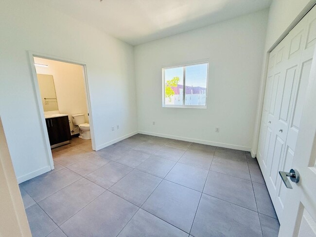 Building Photo - 1295 W 69th St