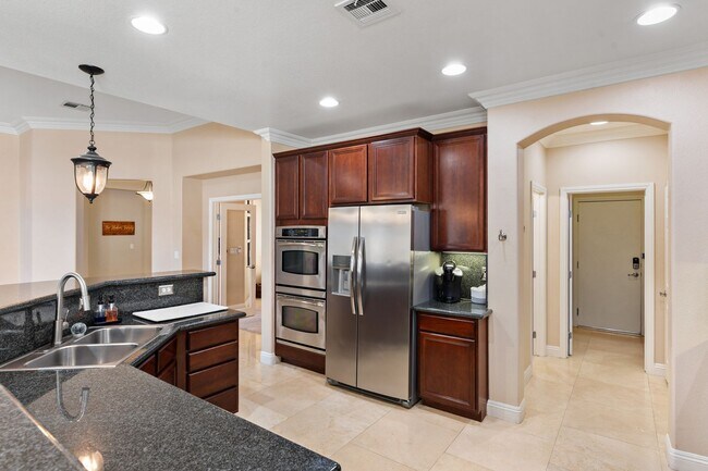 Building Photo - Spacious Mountain’s Edge Home with Den, Sunroom, 3-Car Garage & Private Spa Retreat