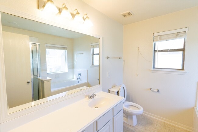 Building Photo - 8011 Singing Sonnet Ln