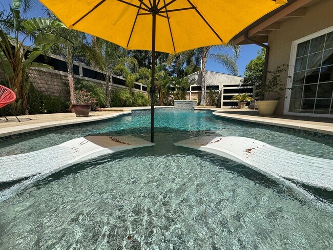 Building Photo - Luxurious Oasis with Resort-Style Pool and...