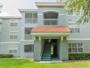 Building Photo - Very nice 2bed/1bath condo on 2nd floor in gated Enclave at Richmond place in New Tampa!