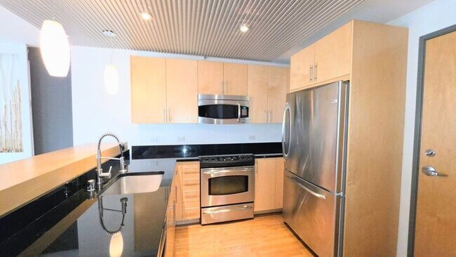 Building Photo - Modern 1 Bedroom 1 Bath Luxury Condo at The Montage – Downtown Reno Living at Its Best. FREE WATE...