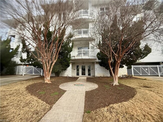 Building Photo - Coastal Comfort: Spacious 2-Bedroom Condo Retreat in Virginia Beach