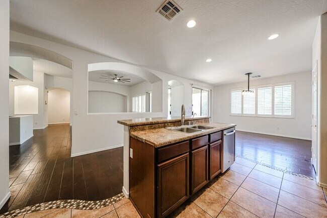 Building Photo - Welcome to this stunning 3-bedroom, 2-bath...