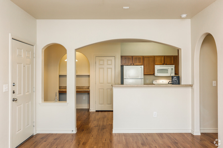 2BR, 2BA - 989SF Living Room and Kitchen - Woodlawn Ranch Apartments