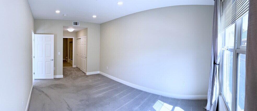 panoramic fisheye photo to show large scale of primary bedroom - 30 E Julian St