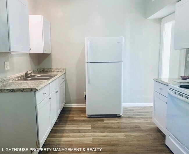 Building Photo - Bright & Delightful 2 Bed/1 Bath Townhome!