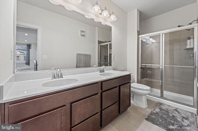 Building Photo - This beautiful 3 bed 2.5 bath 2-story condo provides a grand feeling with tall ceilings & over 16...