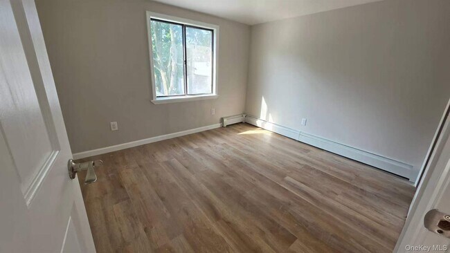 Building Photo - 206-66 46th Ave