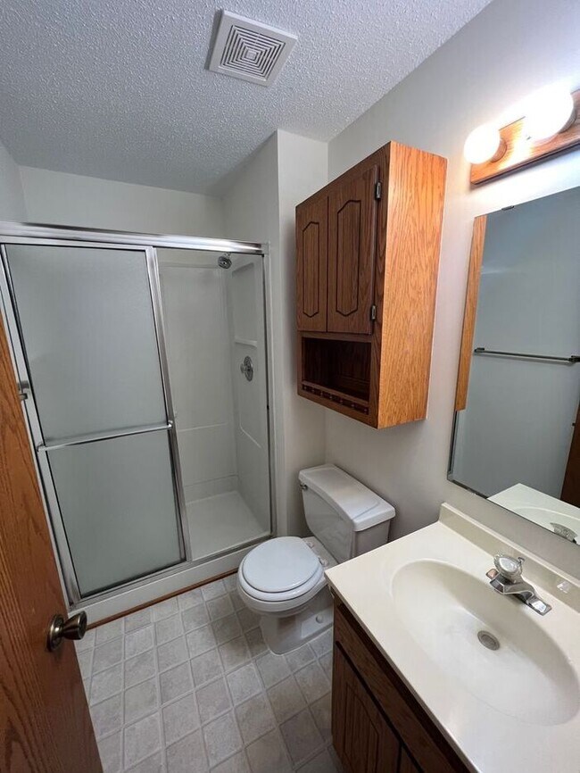 Building Photo - End Unit Single Level Townhouse, New Floor...